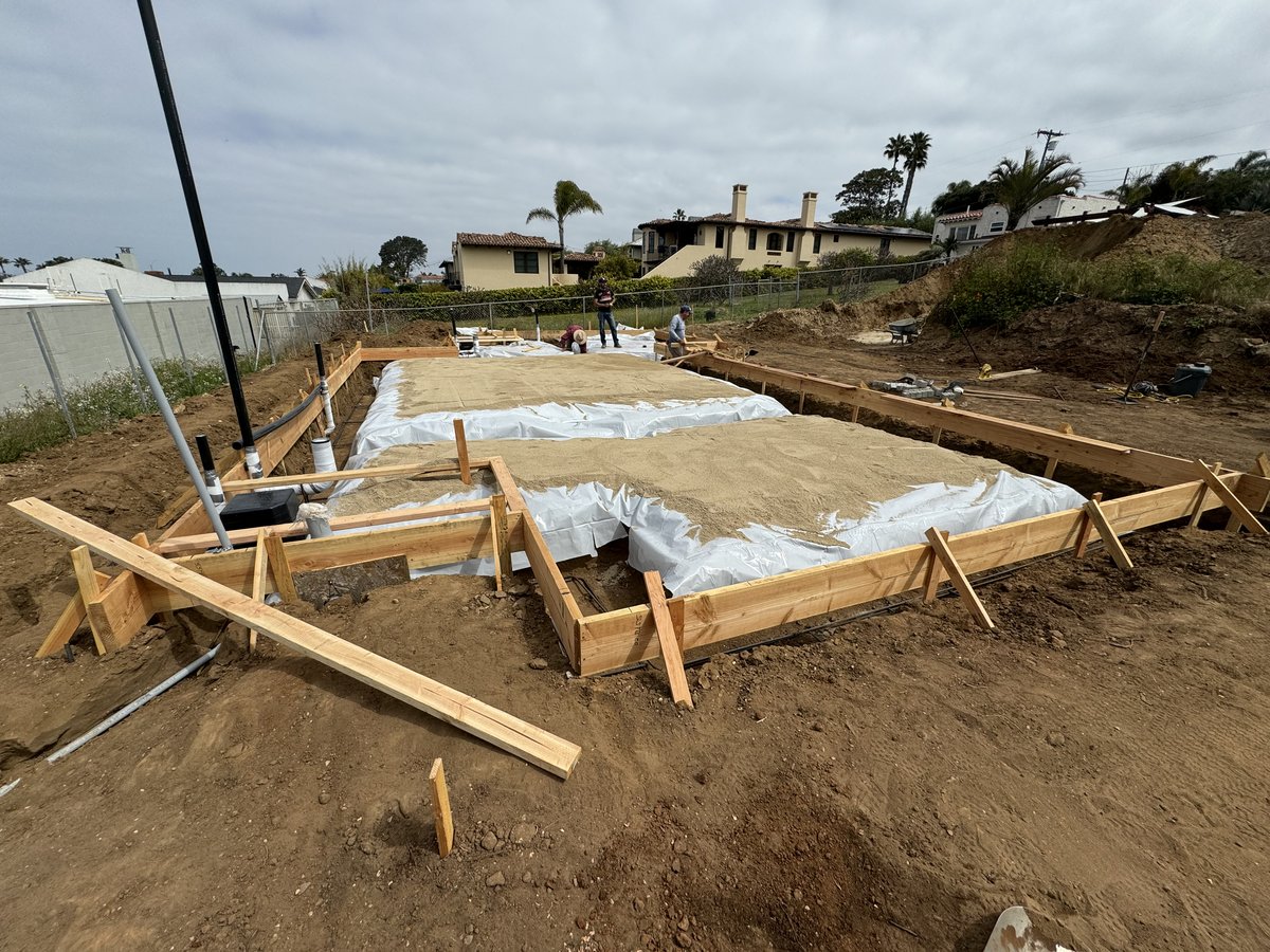 Retaining wall formwork on hillside lot