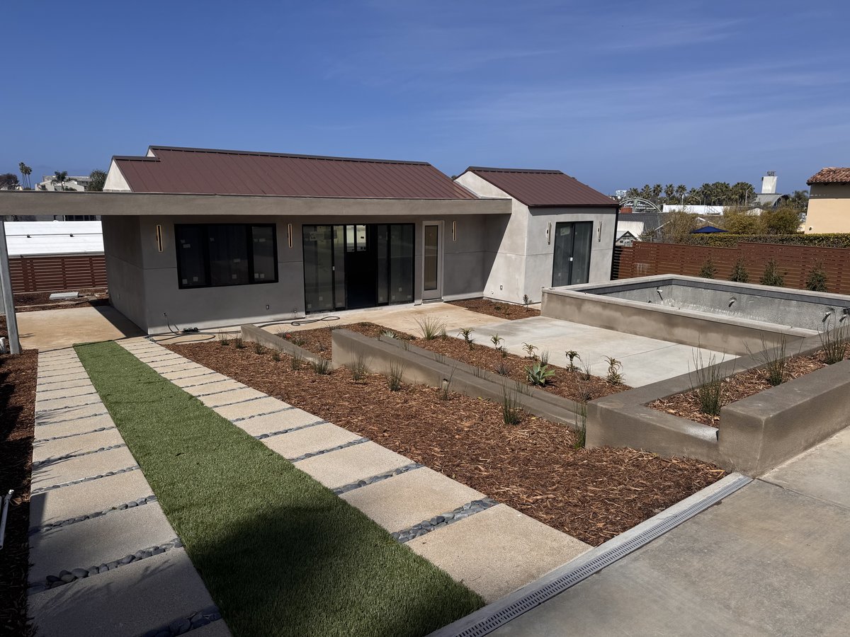 Pool and patio area with modern fencing