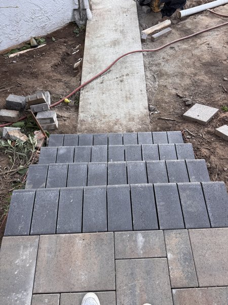 Completed paver walkway with interlocking pattern